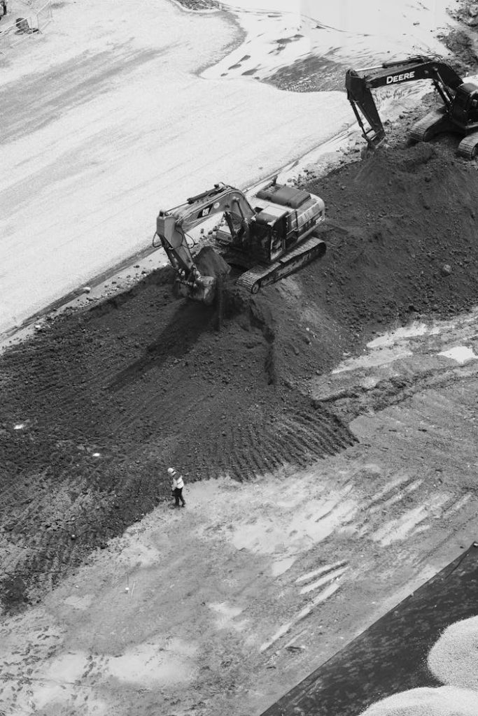 pexels photo 28512239 Aerial view of construction with excavators and worker in Ciudad de México.